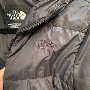 Like new women’s NorthFace mid-length jacket